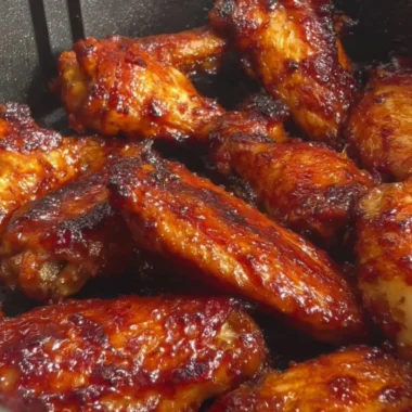 Crispy Air Fryer Soy Garlic Chicken Wings served on a plate with garnish