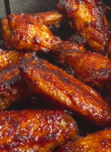 Crispy Air Fryer Soy Garlic Chicken Wings served on a plate with garnish