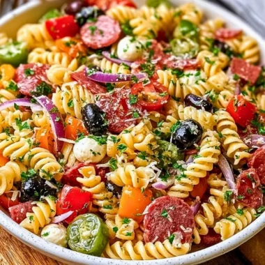 Bowl of easy Italian pasta salad with vegetables and dressing