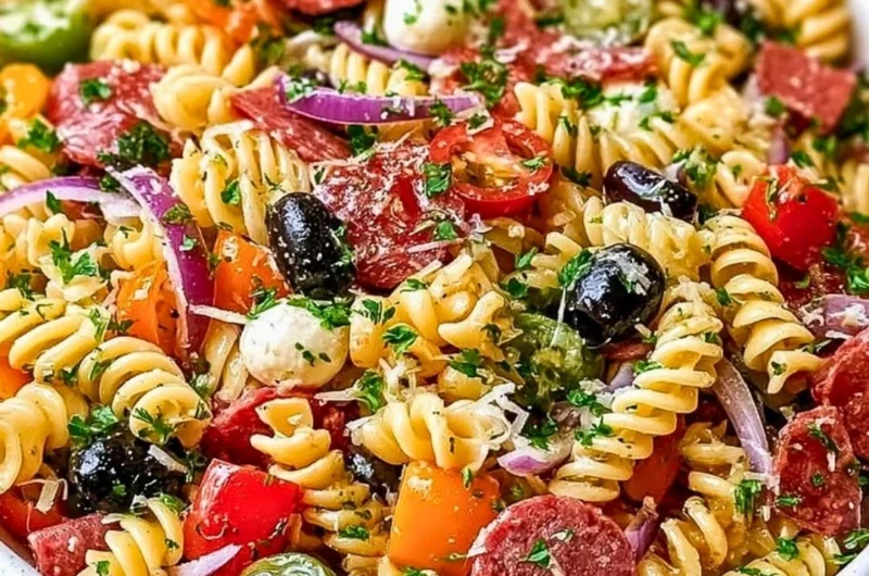 Bowl of easy Italian pasta salad with vegetables and dressing