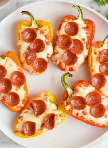 Delicious pizza stuffed mini peppers filled with cheese and toppings