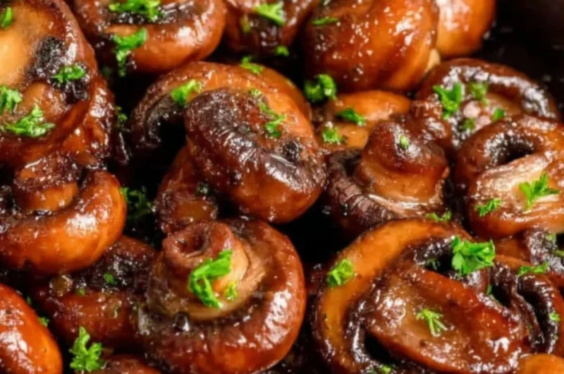 Buttery sautéed mushrooms in a skillet