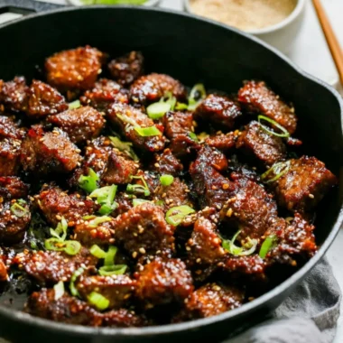 Delicious easy Korean steak bites served with garnishes