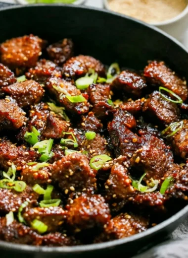 Delicious easy Korean steak bites served with garnishes