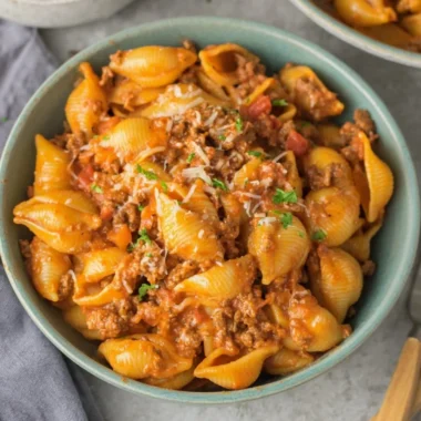 High protein taco pasta dish served in a bowl with toppings