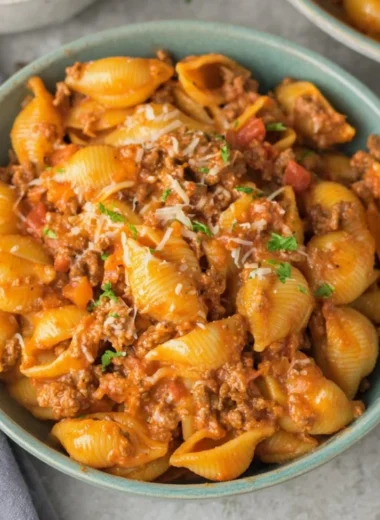 High protein taco pasta dish served in a bowl with toppings