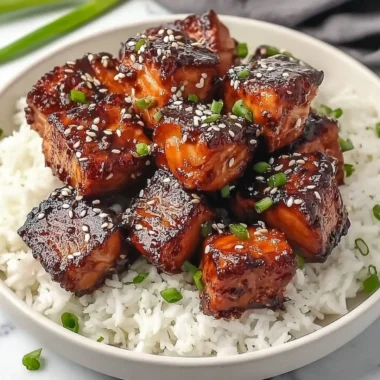 Delicious Honey Garlic Salmon Bites Bowl served with fresh vegetables and rice