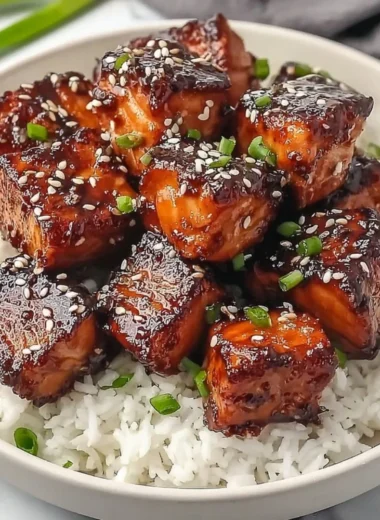 Delicious Honey Garlic Salmon Bites Bowl served with fresh vegetables and rice