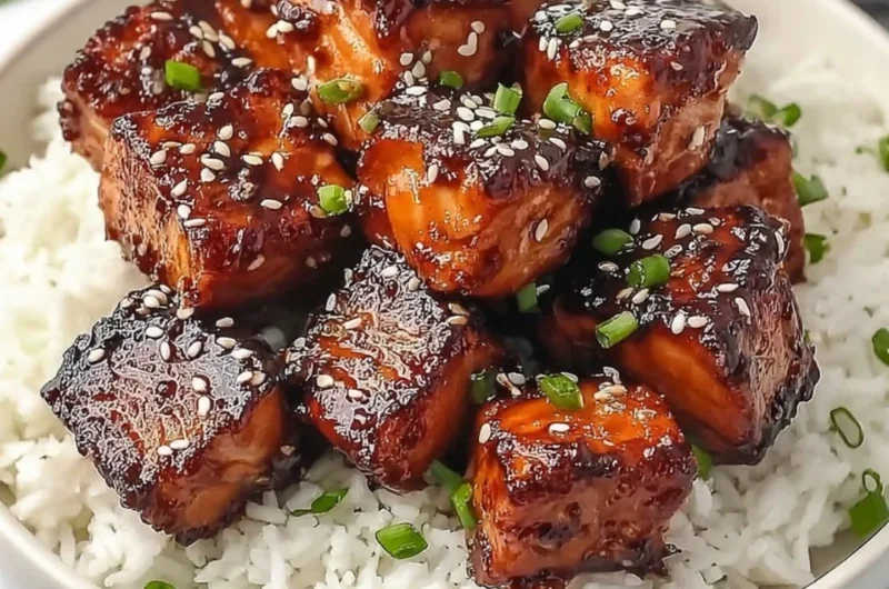 Delicious Honey Garlic Salmon Bites Bowl served with fresh vegetables and rice