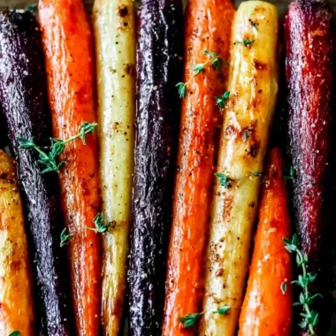 Delicious honey roasted colorful carrots served as a side dish.