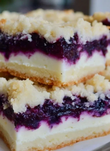 Lemon blueberry shortbread bars with a crunchy crust and fresh blueberries