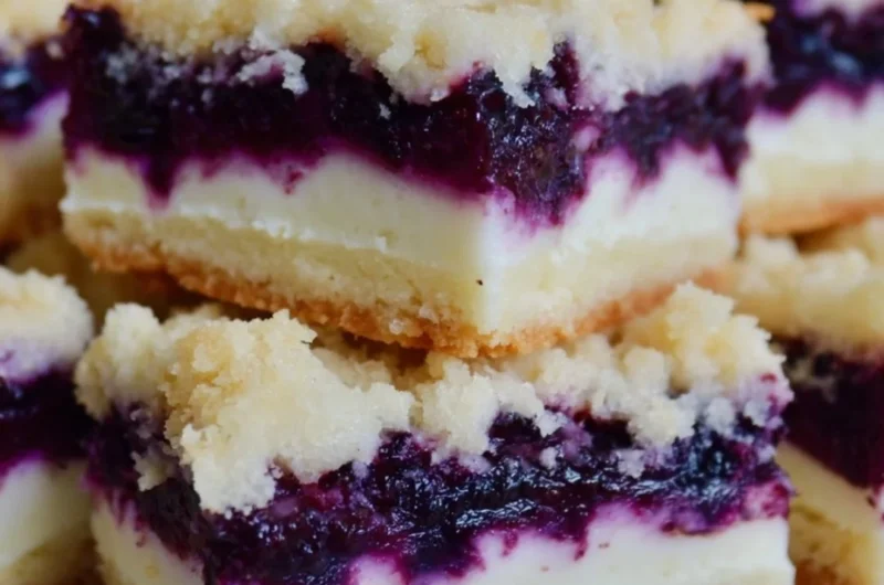 Lemon blueberry shortbread bars with a crunchy crust and fresh blueberries
