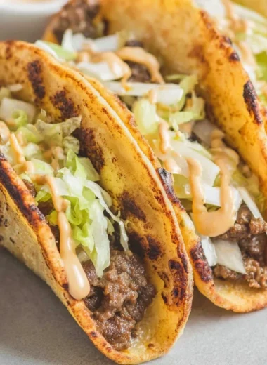 Delicious smash burger tacos served with fresh ingredients and vibrant toppings