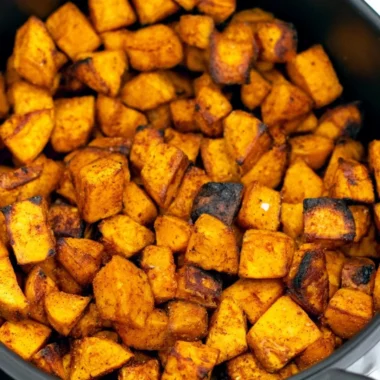 Crispy air fryer sweet potato cubes ready to be served as a healthy dish
