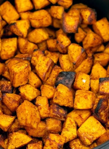 Crispy air fryer sweet potato cubes ready to be served as a healthy dish
