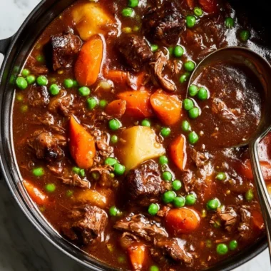 Bowl of delicious homemade beef stew with vegetables and herbs