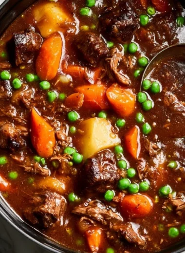 Bowl of delicious homemade beef stew with vegetables and herbs