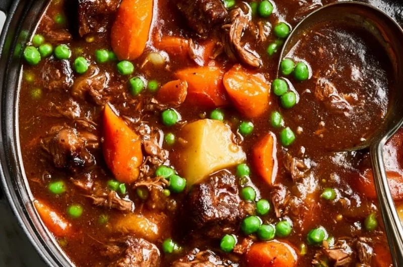 Bowl of delicious homemade beef stew with vegetables and herbs