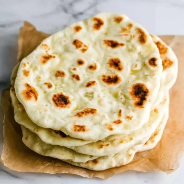 Delicious Greek Pita bread warm and ready for serving with various fillings.