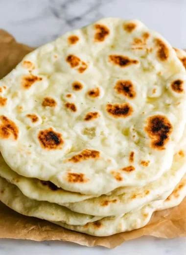 Delicious Greek Pita bread warm and ready for serving with various fillings.