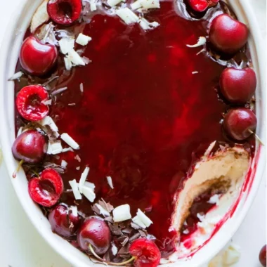 Delicious Cherry Tiramisu dessert served in a glass with cherries on top