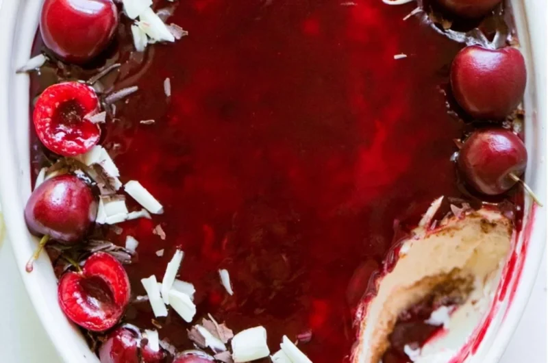 Delicious Cherry Tiramisu dessert served in a glass with cherries on top