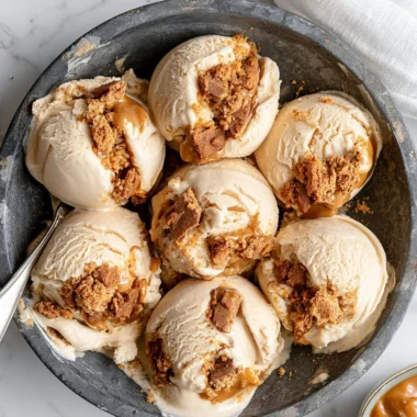 Delicious cookie butter ice cream in a bowl with toppings