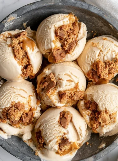 Delicious cookie butter ice cream in a bowl with toppings