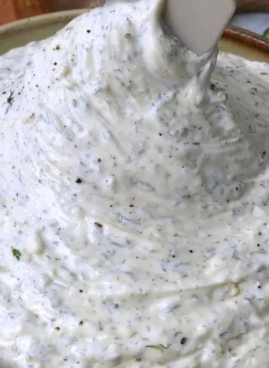 Cucumber Dip served in a bowl garnished with herbs, perfect for parties and gatherings