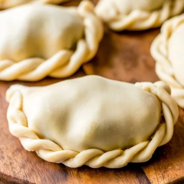 Homemade empanada dough ready for filling and baking