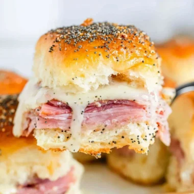 Delicious ham and cheese sliders served on a platter