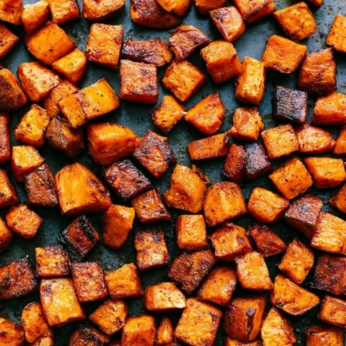 Colorful roasted vegetables on a plate, showcasing healthy and delicious eating.