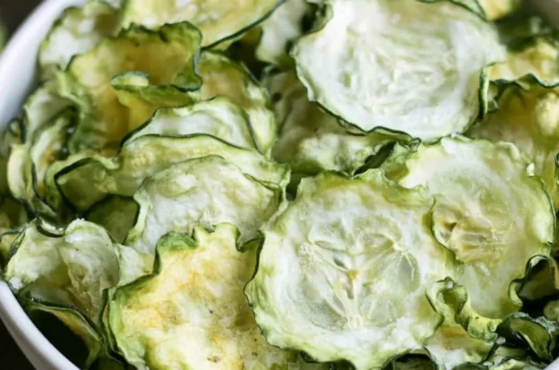Salt and vinegar cucumber chips in a bowl, a healthy crunchy snack