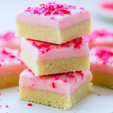 Delicious sugar cookie bars topped with colorful sprinkles