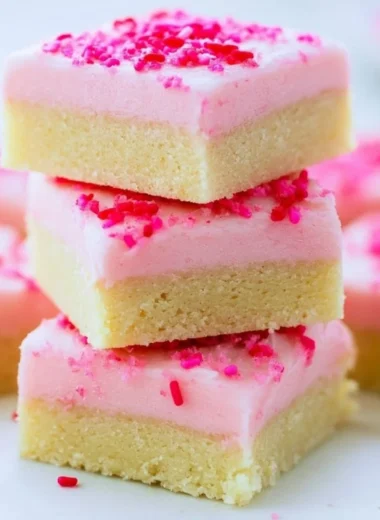Delicious sugar cookie bars topped with colorful sprinkles