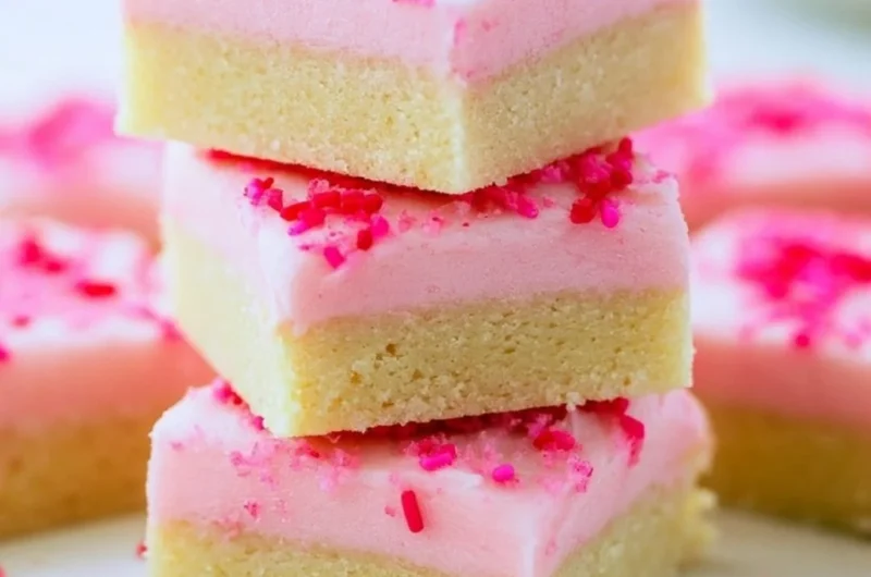Delicious sugar cookie bars topped with colorful sprinkles
