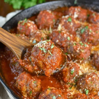 Delicious Italian meatballs served with marinara sauce and spaghetti