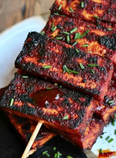 Delicious vegan sweet and spicy BBQ tofu served on a plate
