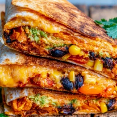 Delicious vegetarian quesadillas served with fresh toppings and dipping sauces.