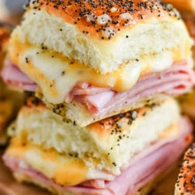 Delicious ham and cheese sliders on a platter ready for serving.