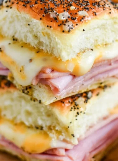 Delicious ham and cheese sliders on a platter ready for serving.
