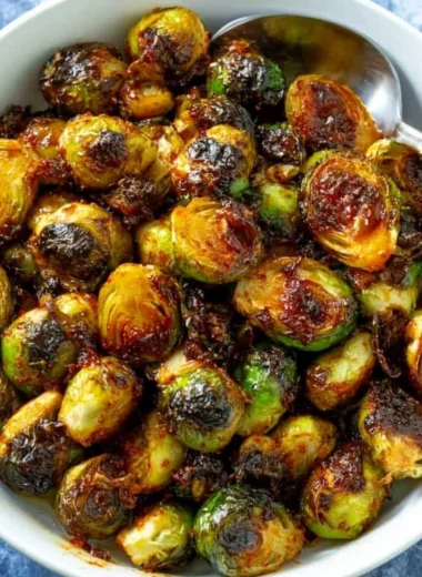 Delicious Honey-Sriracha Brussels Sprouts served as a flavorful side dish