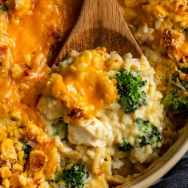 Delicious Broccoli Cheddar Chicken and Rice Casserole topped with cheese