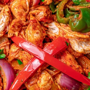 Delicious crockpot chicken fajitas served with colorful vegetables