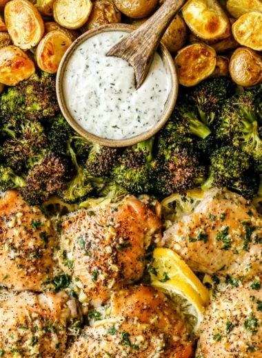 Lemon Garlic Chicken with potatoes and broccoli on a sheet pan