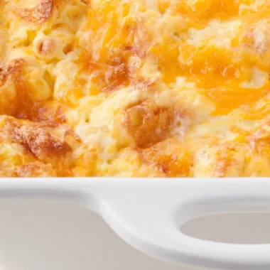Oven scrambled egg and cheese bake casserole on a plate, ready to serve for breakfast.